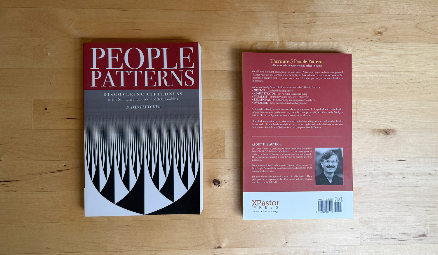 Front and back of the People Patterns book on a wooden table.