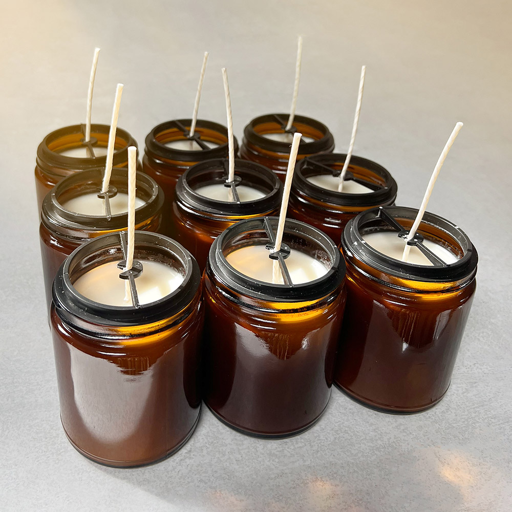 Soy candles cooling after being poured.