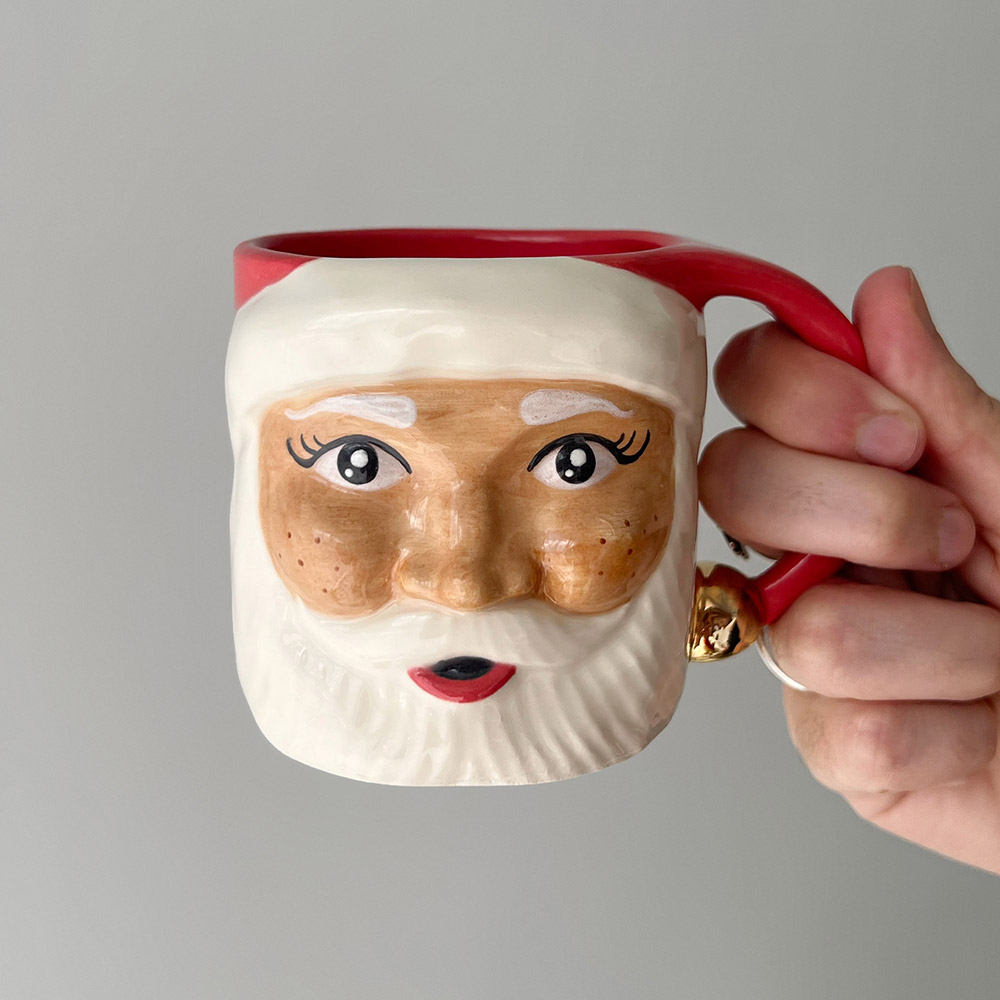 Custom sculpted santa mug.